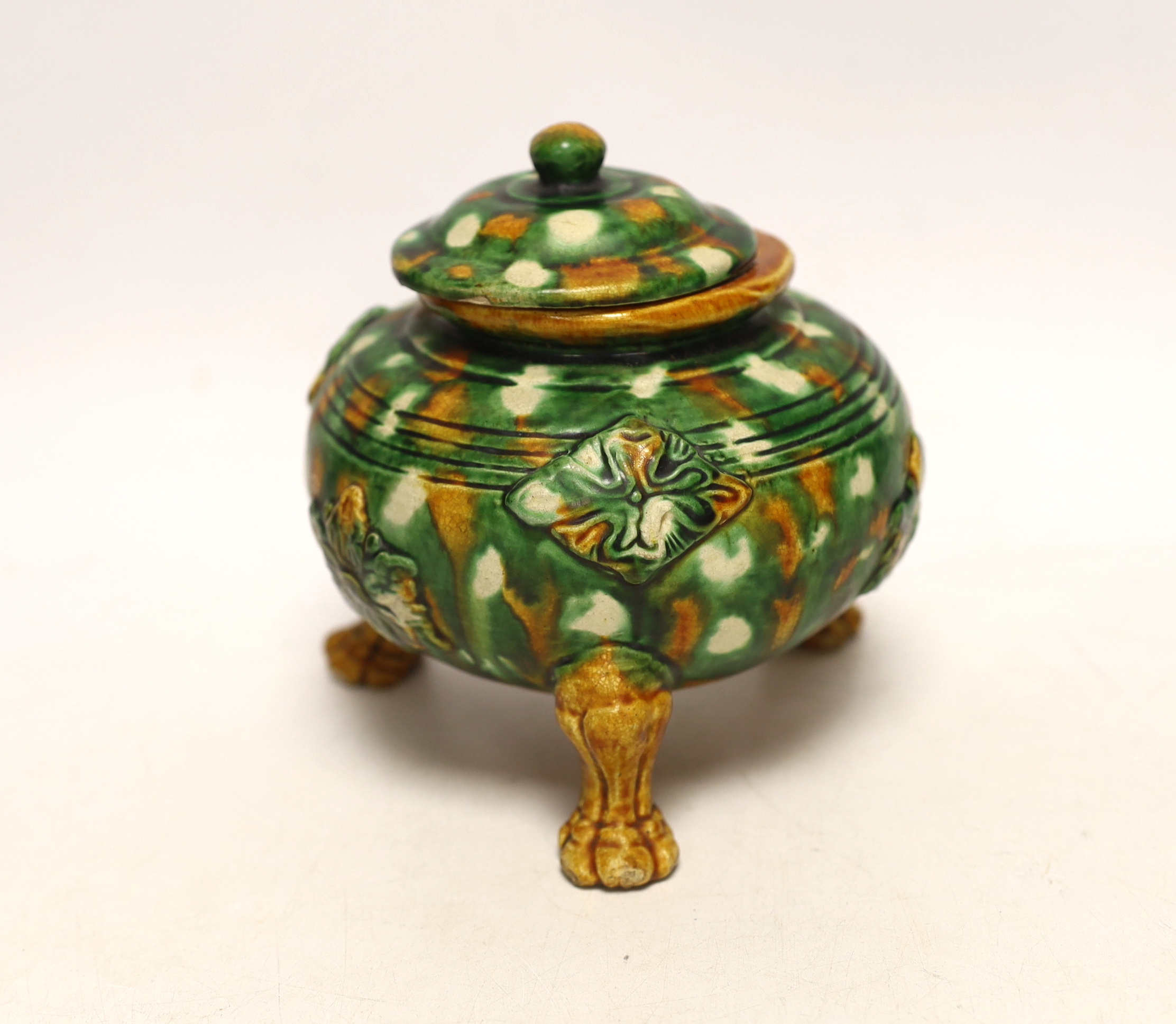 A Sancai three legged lidded pot, 13cm